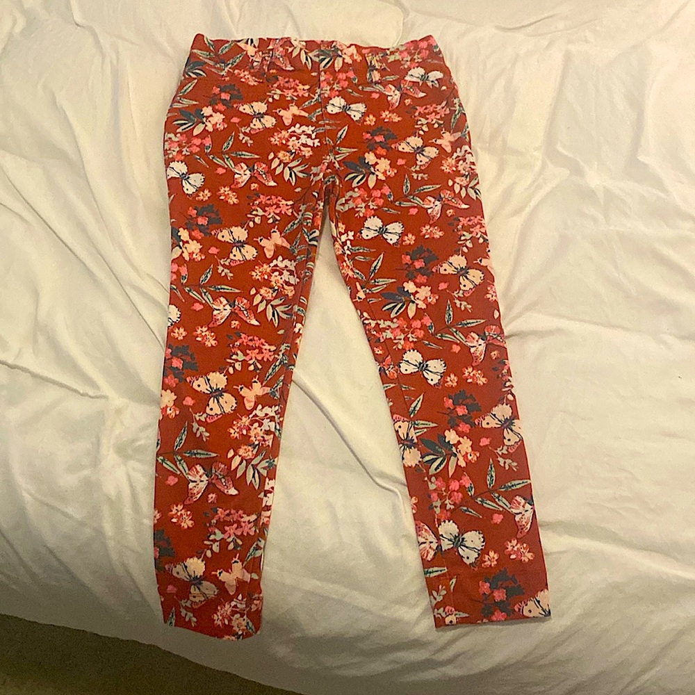 Cute stretchy red capri pants with butterfly and floral design